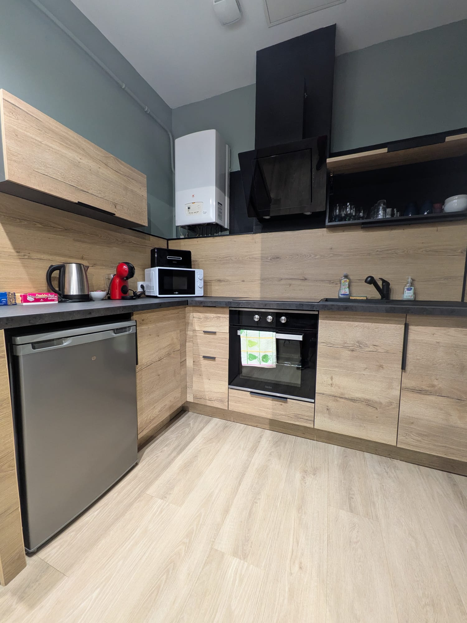 Cuisine équipée d'un logement Airbnb géré par Kabeli Conciergerie à Toulouse